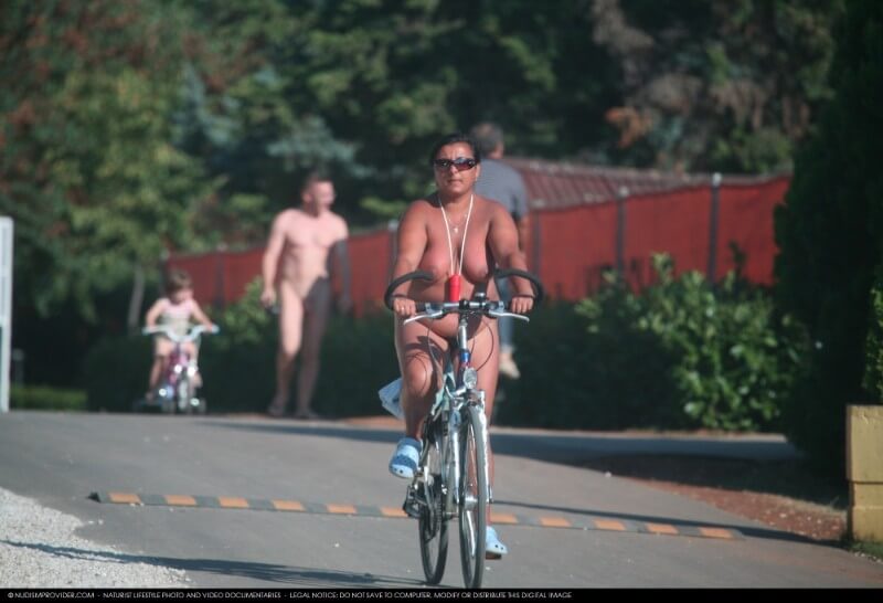 Naturists Road Biking pics - Blending in with the crowd of nudists