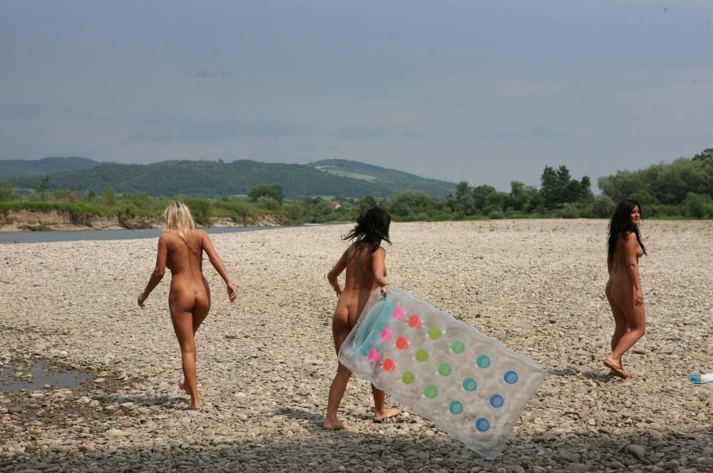 Naturist Park Floating On River photos - Nudism is part of life