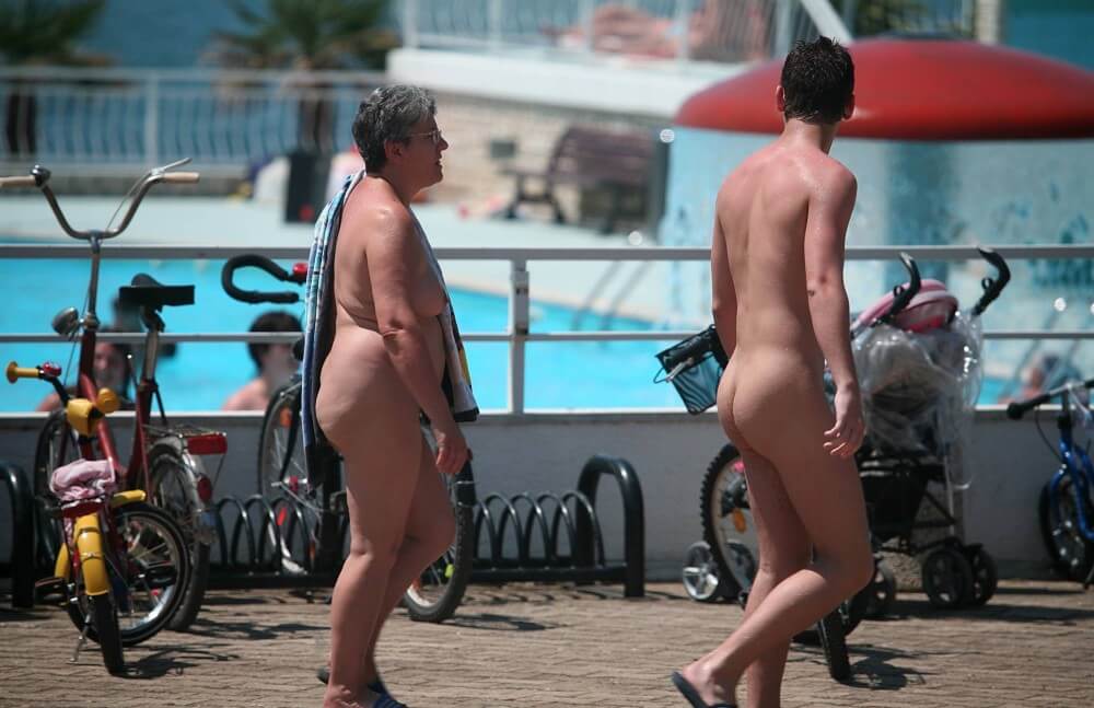 Sun-Soaked Sidewalk pics - Nudism in the Modern World