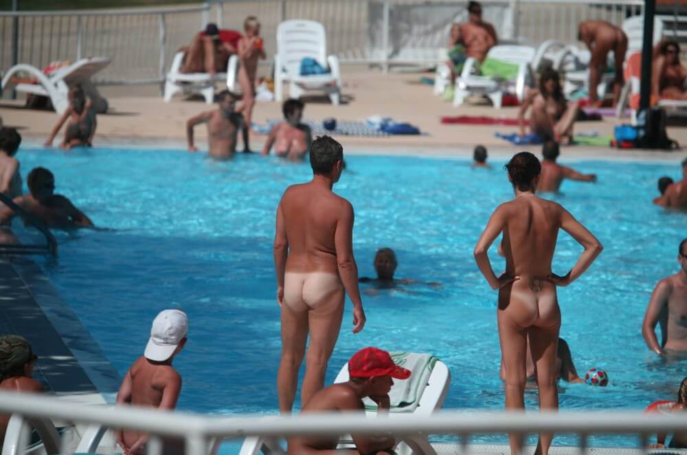 Pool-Shore Group Exercise - Participation in nudism contributes to personal growth