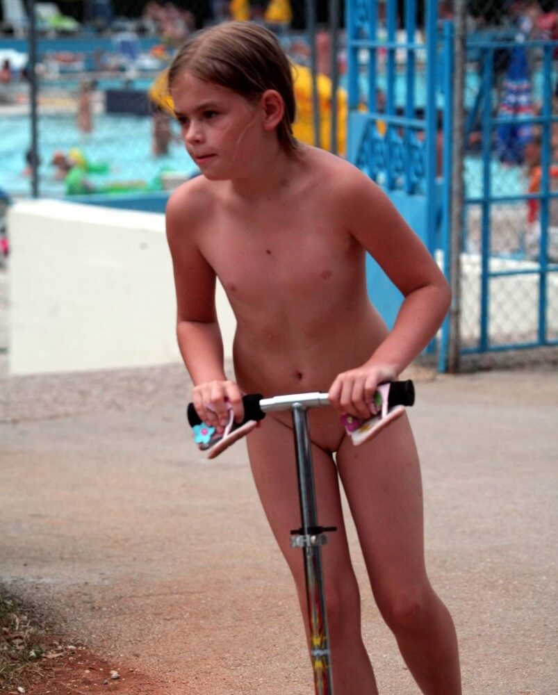 Pool-Side Naturist Scooter pics - Clothing is also a mask for a nudist