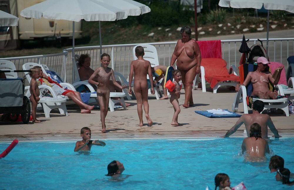 Naturist Afternoon Pool Games pics - Naturism helps us understand the important fact that the body is part of nature