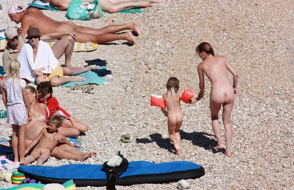 Orange Floaty Safety First Naturist pics - The community of naturist movement supporters and their values